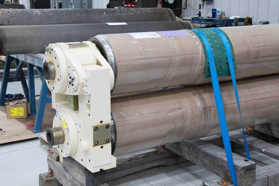 Large industrial cylinders on wooden pallets